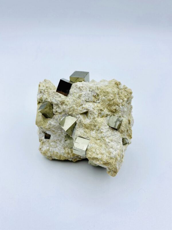 Matrix piece with 16 Pyrite crystals from Navajun, Spain